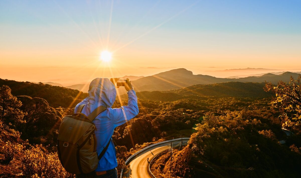 traveller taking in beautiful landscape